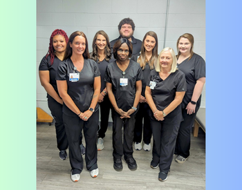 Seven females and one male Rehabilitation Services Staff, smiling
